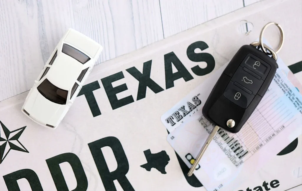 Car insurance without a license in Texas with vehicle registration documents and car keys